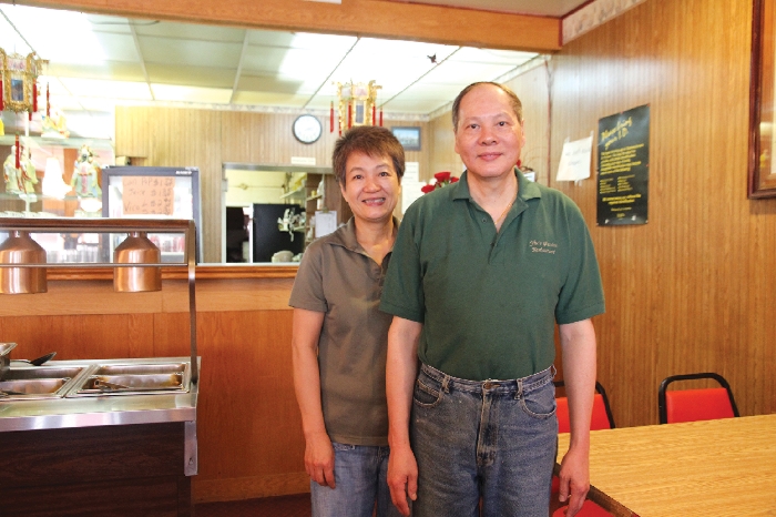 Lisa and Lobo Yiu standing in their restaurant, Yius Garden Restaurant, last week. The couple has been in Moosomin 18 years and in the restaurant business in this area for over 30 years.